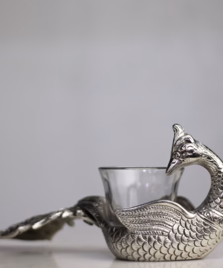 Handcrafted Silver-Finish Metal Peacock Tea Light Holder | 9-Inch Sweeping Tail Centerpiece with Glass Votive